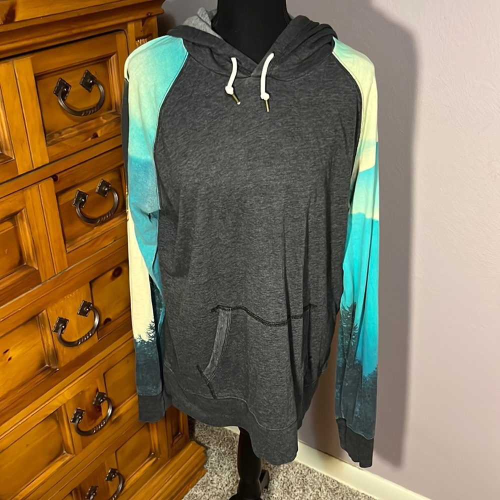 Grey American Eagle hoodie with sleeves showing nature scenes